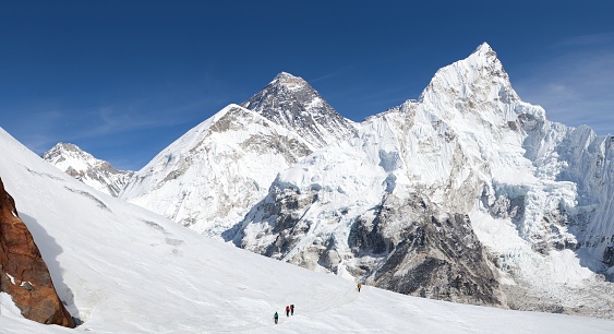 Montage of mount Everest and glacier with hikers, Nepal Himalayas mountains