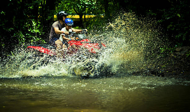 istock driving a four wheeler in costa rica 182918625