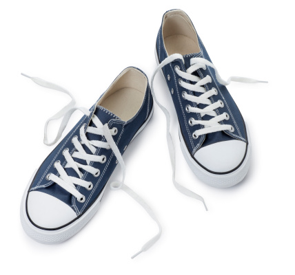 This is an overhead view of blue sneakers isolated on a white background.Click on the links below to view lightboxes.