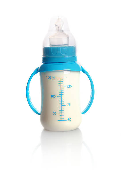Milk in baby bottle stock photo