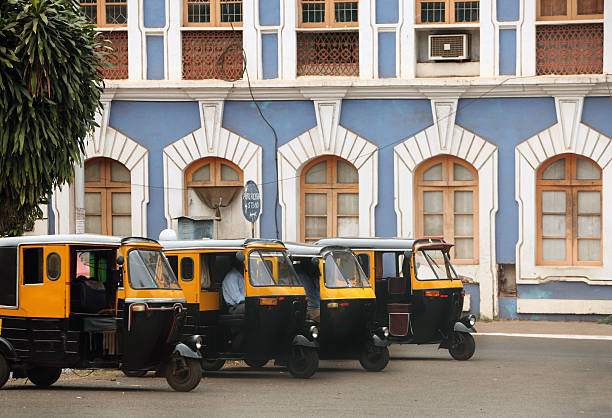 Auto Rickshaws and Old Panjim Architecture "Streets of Old Panjim. This is a Capital City of Goa Province in India, long time colony of Portugal. This city was an important stop of the trade and influence in Asia." auto rickshaw taxi india stock pictures, royalty-free photos & images