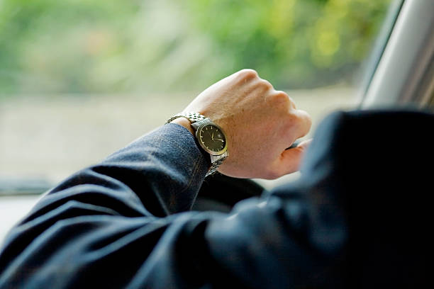 A men's wristwatch on a dark background.  Designed and modelled in 3D by myself. All markings and designs are fictitious.  Very high resolution 3D render.