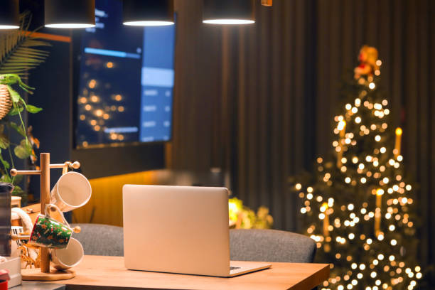 istock Working from Home Environment at Night, New Year's Home Decoration, Christmas Tree, New Year Concept, Working At Home , Home Office 1829202893
