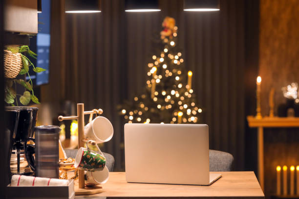 istock Working from Home Environment at Night, New Year's Home Decoration, Christmas Tree, New Year Concept, Working At Home , Home Office 1829203912