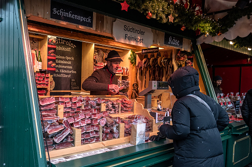 Leipzig, December 3, 2023.
Leipzig's main Christmas market is located on MarktPlatz in the old town. It is also considered the second oldest Christmas market in Germany, having been held since 1458. 
Food shop at the Leipzig Christmas market.
