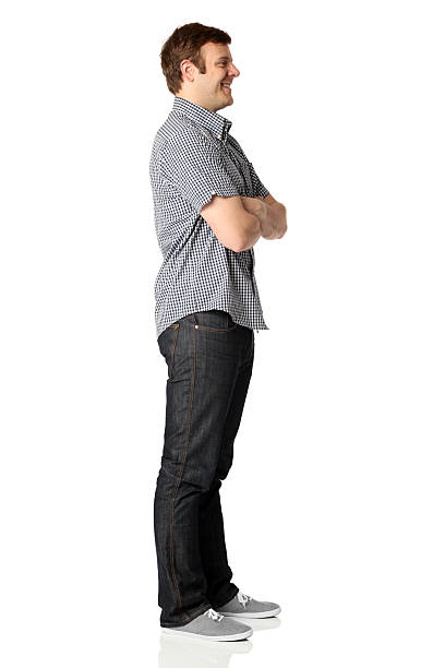 istock Man standing with arms crossed 182921197