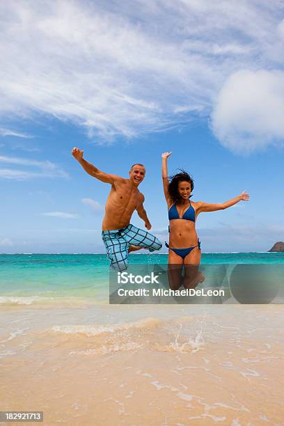 Beach Leap Stock Photo - Download Image Now - 25-29 Years, 30-34 Years, Active Lifestyle