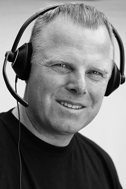 istock Mature male customer service representative smiling 182921922