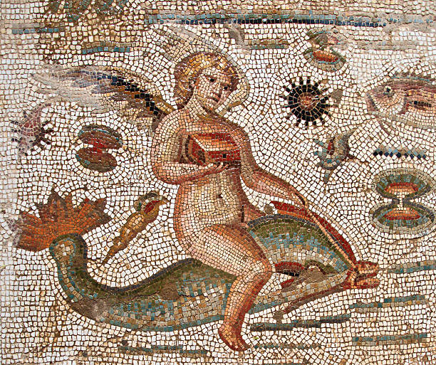 Tunisia: Roman Era Mosaic of Angel Riding DOlphin, Bulla Regia "Tunisia: Roman Era Mosaic of Angel Riding DOlphin, from Bulla Regia (detail)More photos of Tunisia and its heritage are in" regia stock pictures, royalty-free photos & images