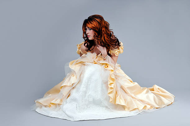 istock bride posing in a gorgeous dress 182923284
