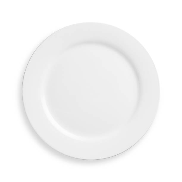 A white plate on a white background Empty dinner plate isolated on white with clipping path plate stock pictures, royalty-free photos & images