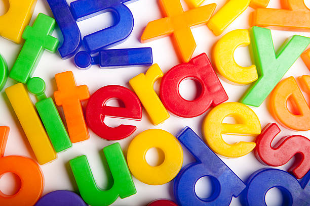 the word literacy in colorful letters
