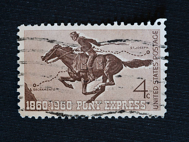 Pony Express Stamp A  cancelled 4 cent postage stamp from 1960 honoring the Pony Express mail delivery saint joseph stock pictures, royalty-free photos & images