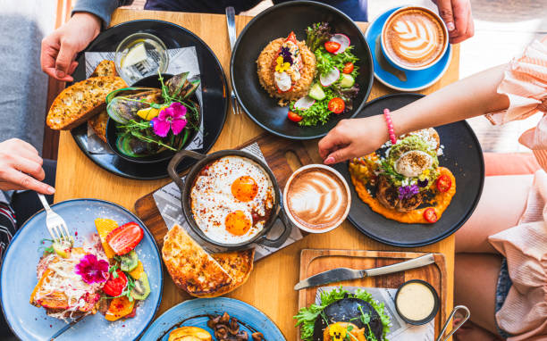 istock Dining table with variety of dishes. 1829240599
