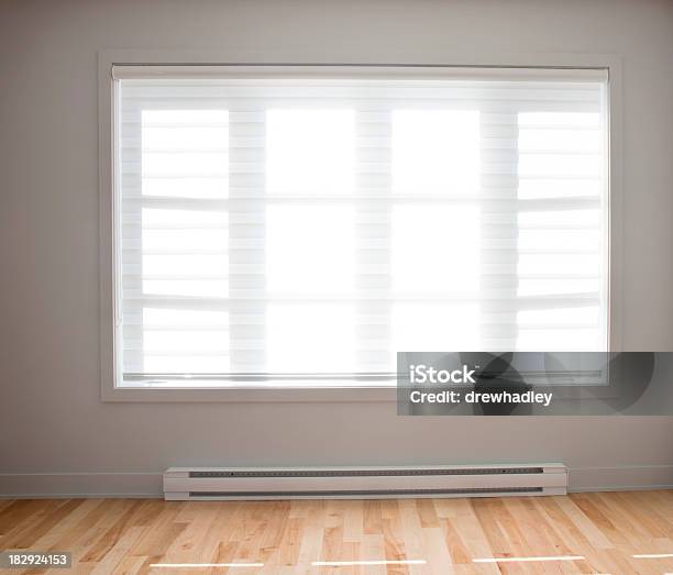Large Residential Window With Wooden Floors Stock Photo - Download Image Now - Baseboard, Heat - Temperature, Window Blinds