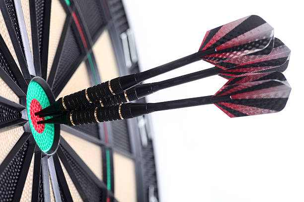 istock Three darts in bull's eye, isolated 182924528