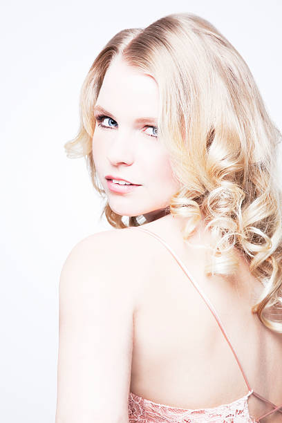 istock Blond smiling woman with curls 182924591