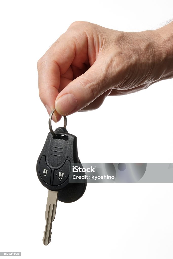 Segurando uma chave de carro contra fundo branco - Royalty-free Chave de Carro Foto de stock