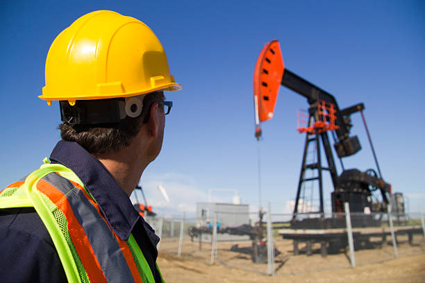 istock Looking at an Oil Derrick 182924819