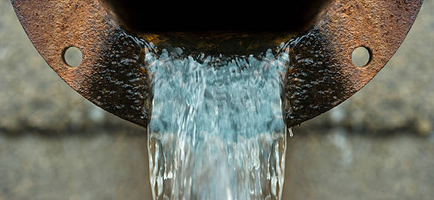 Drain CLose up of sewage drain. sewage stock pictures, royalty-free photos & images