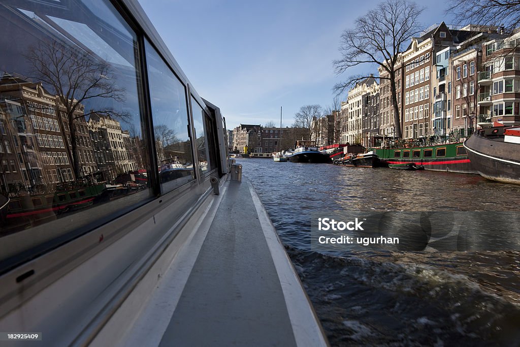 Amsterdam boats on Amsterdam Canal. Amsterdam Stock Photo