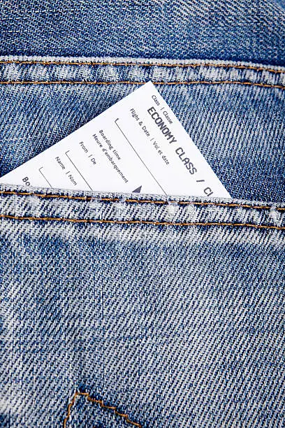 Flight ticket in jeans pocket