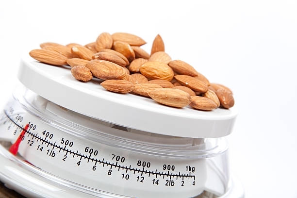 Food Almonds on Scale stock photo