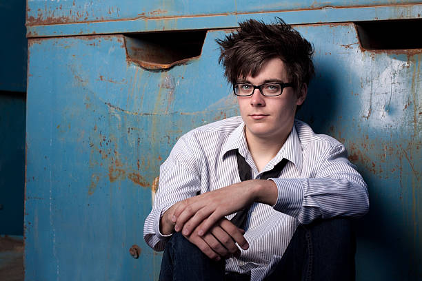 istock Young Man with Serious Expression in Dress Shirt and Tie 182926217