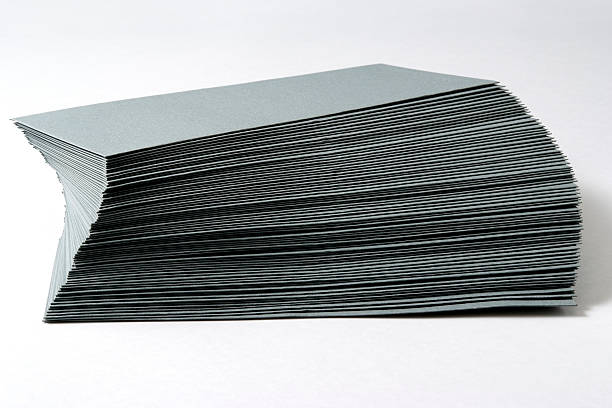 istock Isolated shot of stacked gray envelopes on white background 182926947