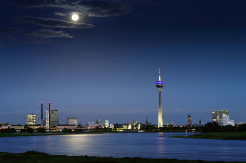 Night scene in Düsseldorf at the Rhine river with the Rheinturm Tower.Photos from Düsseldorf: