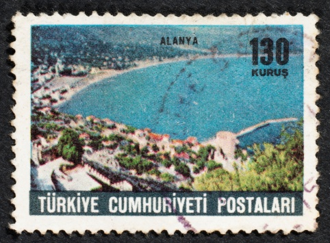 Turkish postage stamp on black background