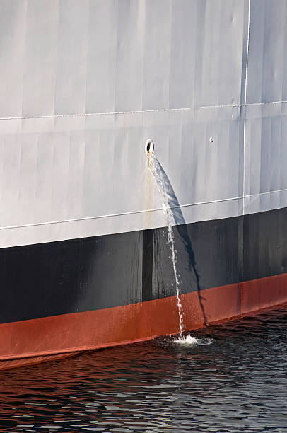 istock Water discharging from ship into lake 182928017