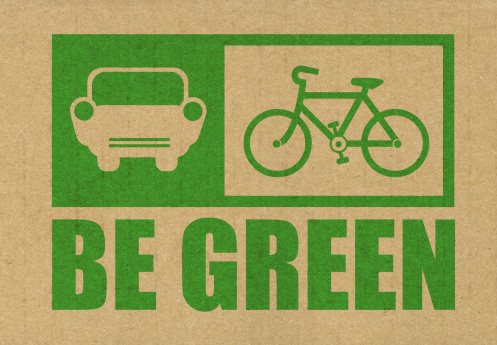 be green stamped on to the side of recycled cardboard in green ink. Bike and car drawn and created by myself