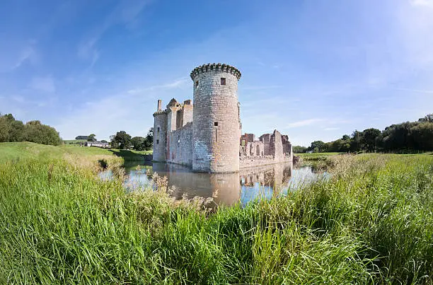"The moated 13th Century Caerlaverock Castle on the Solway Firth just south of Dumfries, Scotland. Unique in Britain for its triangular plan."