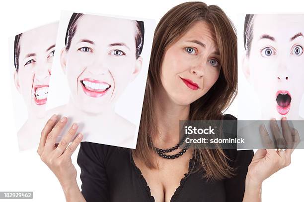 Verwirrt Frau Hält Fotos Von Ihren Emotionen Stockfoto und mehr Bilder von Bipolare Störung - Bipolare Störung, Menschliches Gesicht, 35-39 Jahre