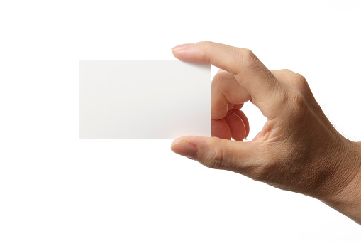 Holding a blank business card isolated on white background.