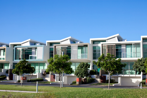 New modern luxury urban apartments with blue sky for copy space. Click to see more...