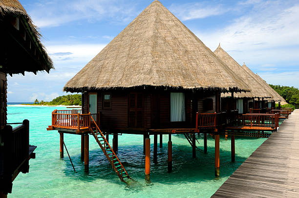 istock Overwater-Bungalows and an island in background 182930490