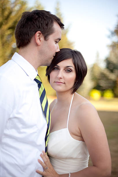 istock Bride and groom standing together 182930559