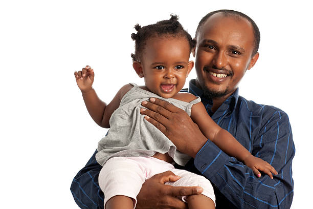 felice padre con figlio/a. - ethiopian people foto e immagini stock