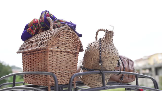 Traditional Wicker Baskets on Luggage Rack on top of car