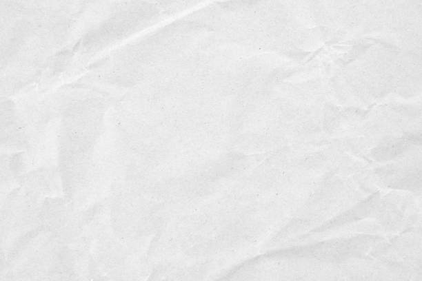 istock Abstract white crumpled and creased recycle paper texture background 1829337840