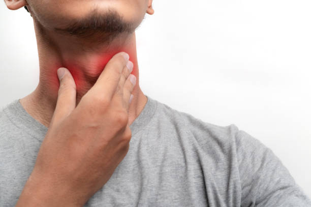 istock man with neck pain on white background 1829341042