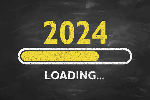 Loading New Year 2024 on Chalkboard Background