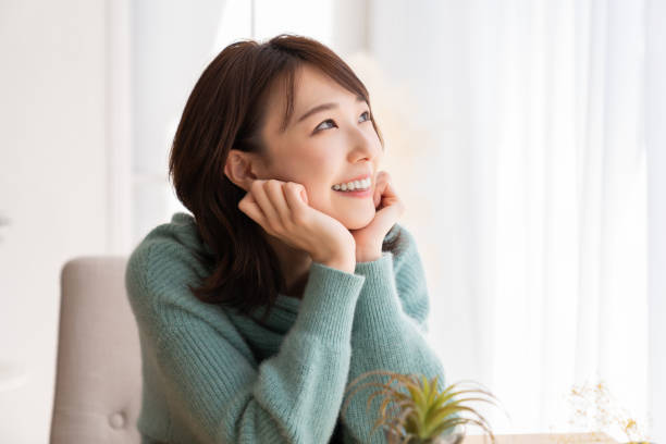 istock young attractive asian woman 1829385389