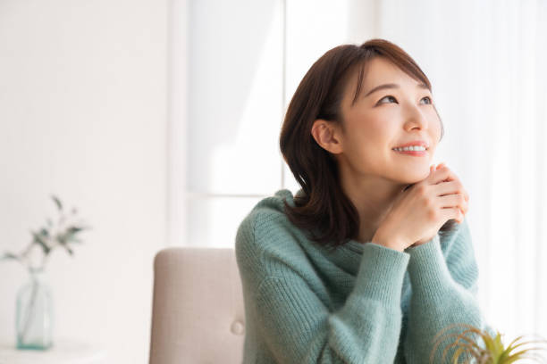 istock young attractive asian woman 1829385399