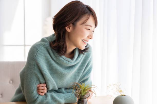istock young attractive asian woman 1829385411