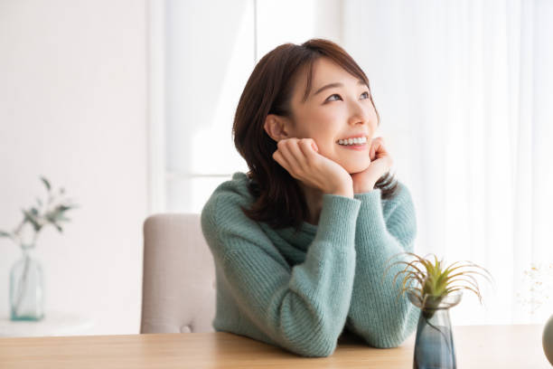 istock young attractive asian woman 1829388080