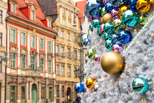 Christmas balls with reflected old city buildings on the Wroclaw Market Square, closeup, Poland