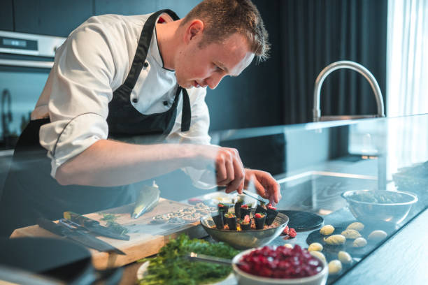 istock Expert Chef Crafting Gourmet Cuisine for Celebration 1829395253